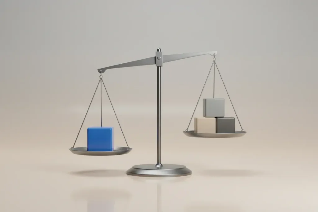 Minimal balance scale: one blue cube outweighs a stack of muted cubes on a soft gray background.